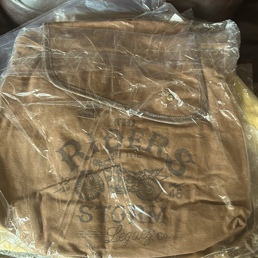 Brand new brown “riders storm” tote bag.